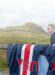 USA jerseys hanging over fence